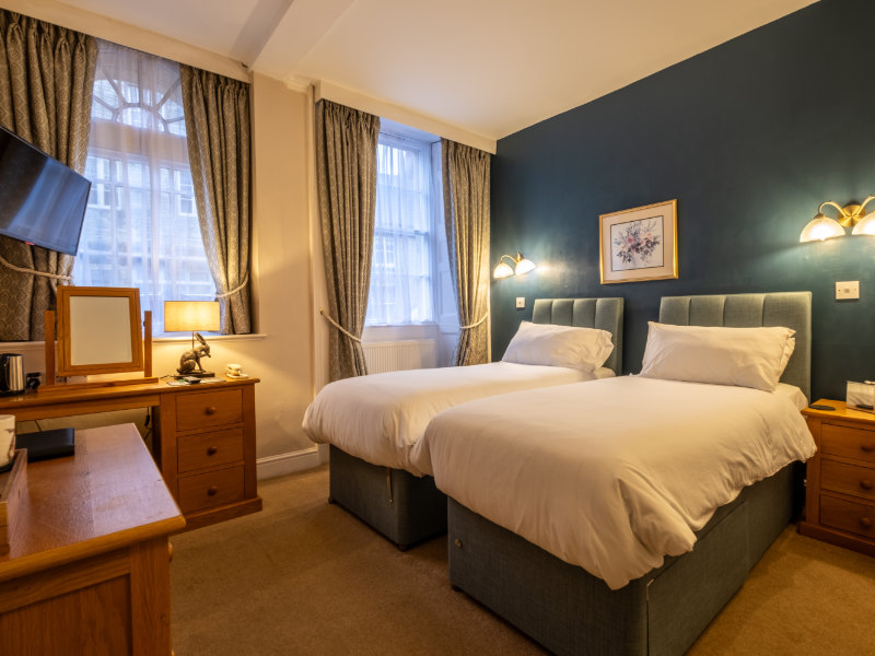 Room 2, one of the twin bedrooms at The Corinium Hotel